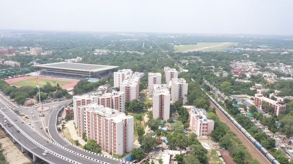 Aerial view of BBVATS-delivered civic landscape — Thyagraj Nagar housing & Chhatrasal Stadium, Delhi